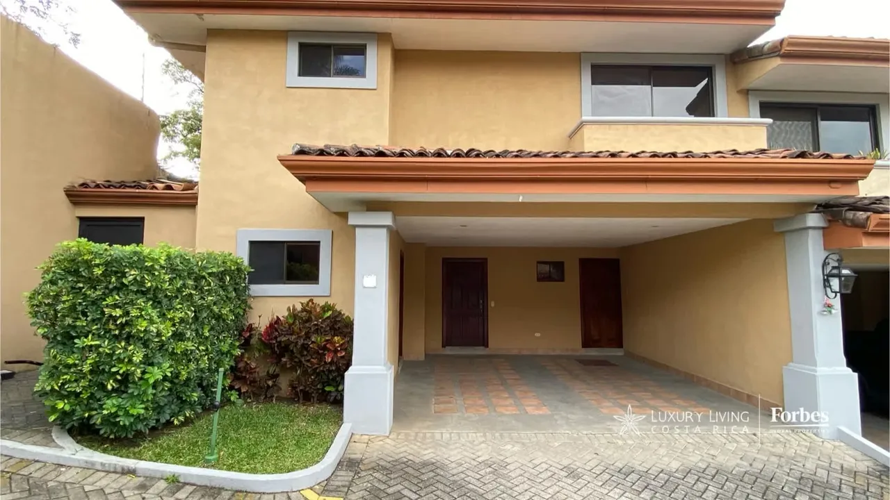 Two-level 3-bedroom home located in a family-oriented gated community in Escazú, recently painted and updated with ...